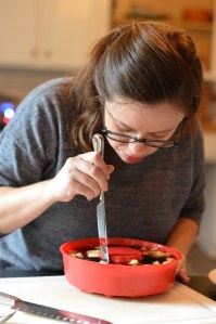 woman running knife around Jello mold